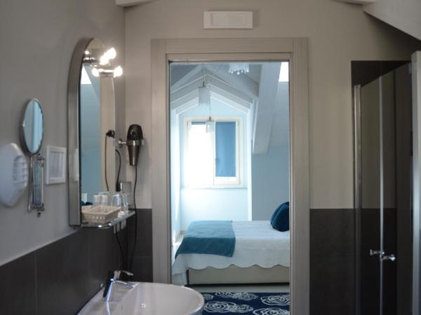 Hotel Giulio Cesare : photo 6 de la chambre chambre quadruple supérieure