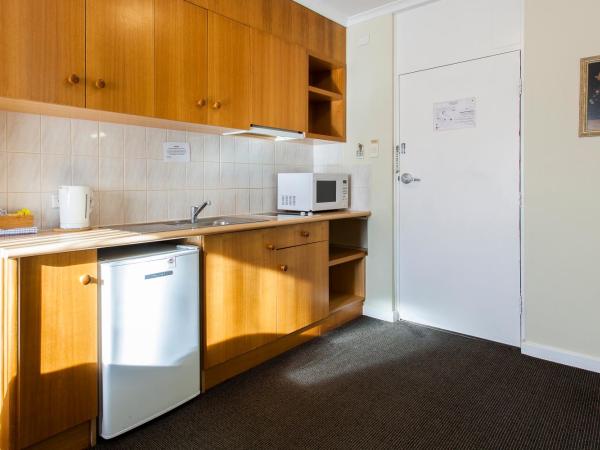 Kings Park Motel : photo 4 de la chambre chambre exécutive lit queen-size