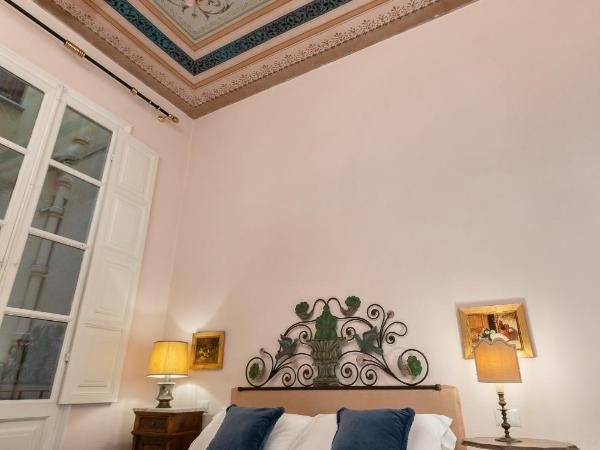 Bellezza Suites : photo 6 de la chambre chambre lit king-size standard