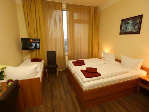 Hotel AI Königshof : photo 4 de la chambre chambre triple