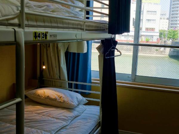 Fukuoka Tabiji Hostel & Guesthouse : photo 2 de la chambre lit dans dortoir mixte de 4 lits