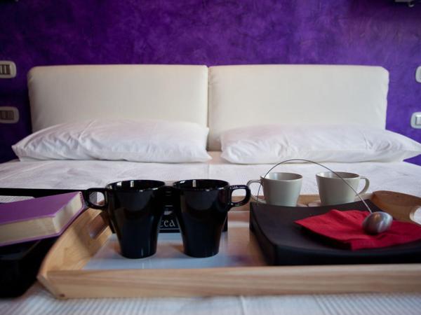 Bed & Breakfast Parmacentro : photo 7 de la chambre chambre familiale avec salle de bains privative