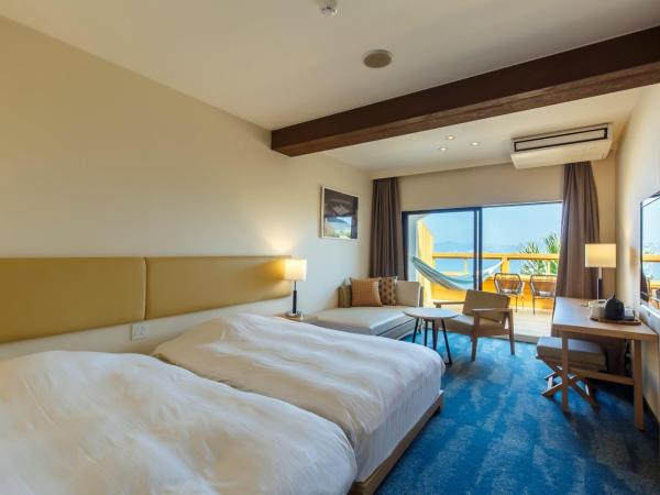 i + Land Nagasaki : photo 1 de la chambre chambre lits jumeaux - vue sur océan
