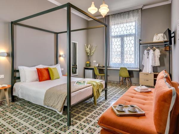 Mosaic : photo 1 de la chambre suite deluxe avec lit queen-size