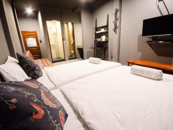 Tian Tian Hostel : photo 1 de la chambre chambre lits jumeaux supérieure