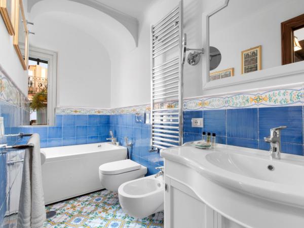 Palazzo delle Grazie : photo 7 de la chambre chambre double deluxe avec baignoire