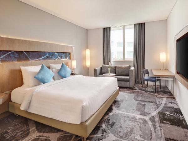 Novotel Jakarta Mangga Dua Square : photo 2 de la chambre chambre lit king-size deluxe - Étage premier