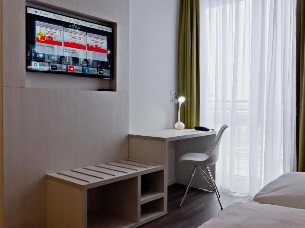 Super 8 by Wyndham Munich City West : photo 3 de la chambre chambre double standard