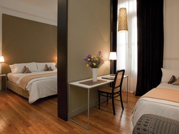 Esplendor by Wyndham Savoy Rosario : photo 4 de la chambre concept superior triple room with three twin beds