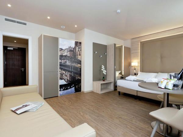 Duomo Hotel & Apartments : photo 7 de la chambre chambre triple premium