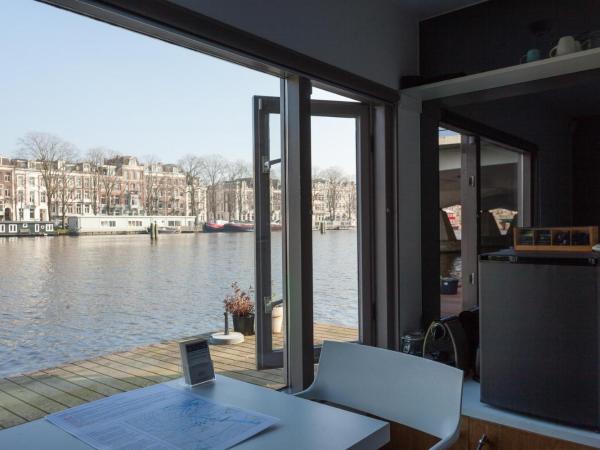 Houseboat Little Amstel : photo 1 de la chambre chambre lits jumeaux basique - vue sur rivière