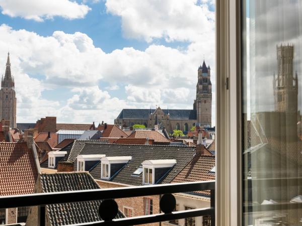 Dukes' Palace Brugge : photo 1 de la chambre chambre double ou lits jumeaux supérieure avec vue sur ville