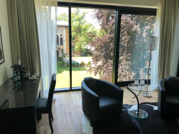 Voss Villa : photo 3 de la chambre suite junior confort avec vue sur le jardin