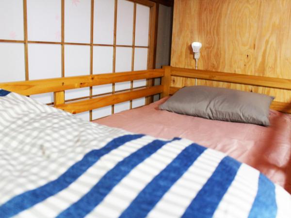 GUEST HOUSE SaKURa : photo 6 de la chambre lit superposé dans dortoir pour femmes 