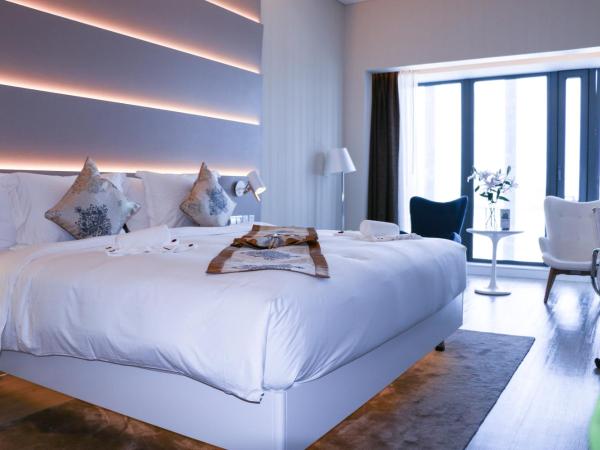 Sanya Phoenix Airport Hotel : photo 4 de la chambre chambre lit king-size supérieure