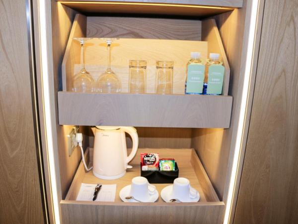 Sanya Phoenix Airport Hotel : photo 1 de la chambre chambre lit queen-size deluxe