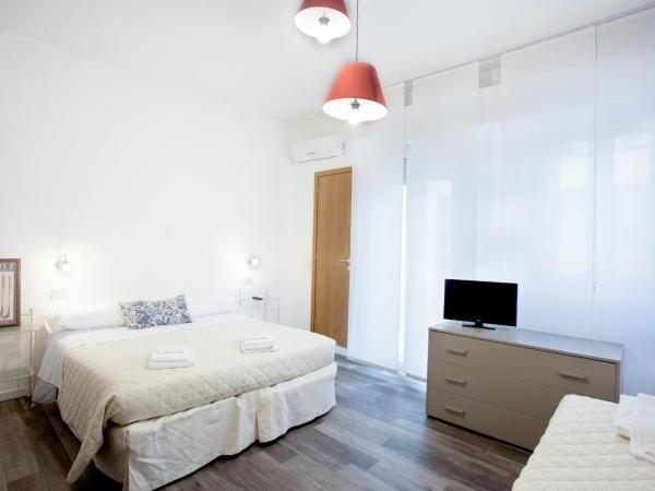 Hotel Spring : photo 3 de la chambre chambre triple avec balcon