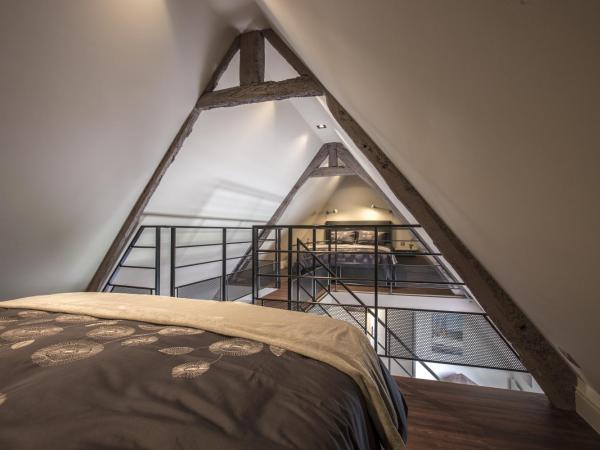 Capitainerie Clos Morin : photo 1 de la chambre suite familiale avec accès gratuit au spa