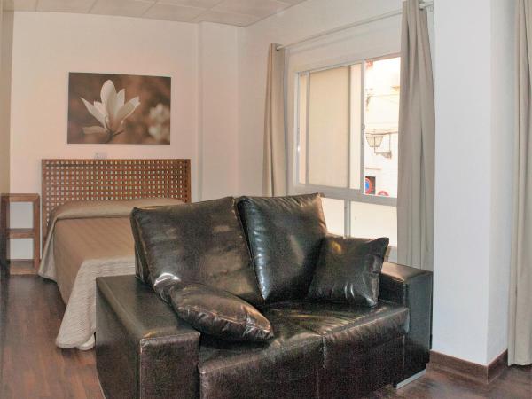 Hostal Jentoft : photo 1 de la chambre chambre familiale deluxe