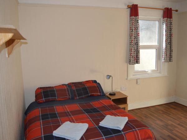 Library View Villa Holiday Home : photo 9 de la chambre chambre familiale