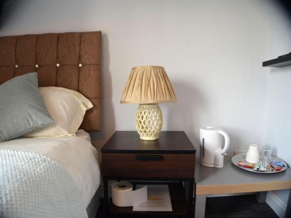 Queens Guesthouse Manchester : photo 5 de la chambre petite chambre simple