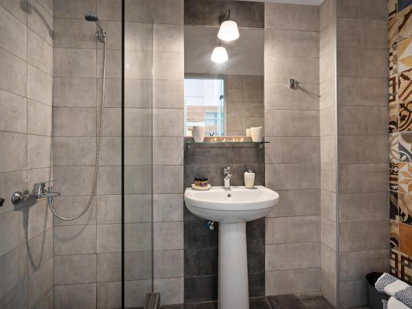 Yacinthos : photo 4 de la chambre studio demi sous-sol (2 adultes)