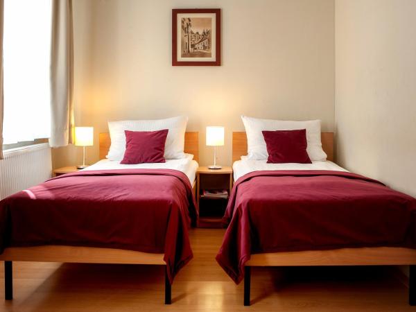 Mały Kraków Aparthotel : photo 5 de la chambre chambre double ou lits jumeaux