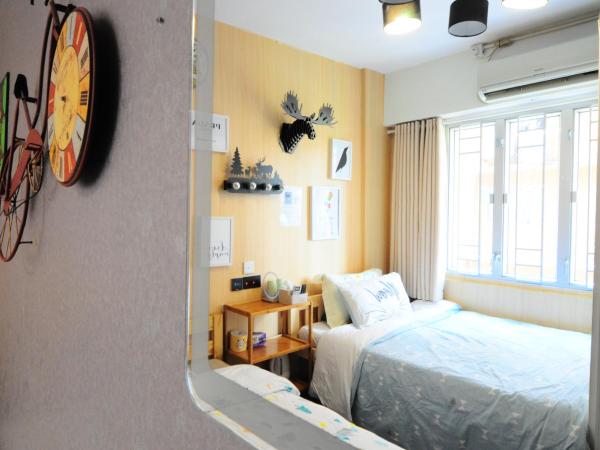 Big Wave Travel : photo 7 de la chambre chambre quadruple avec vue sur la ville