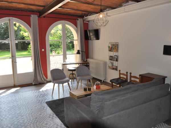 Au Rez de Jardin : photo 2 de la chambre appartement - vue sur jardin