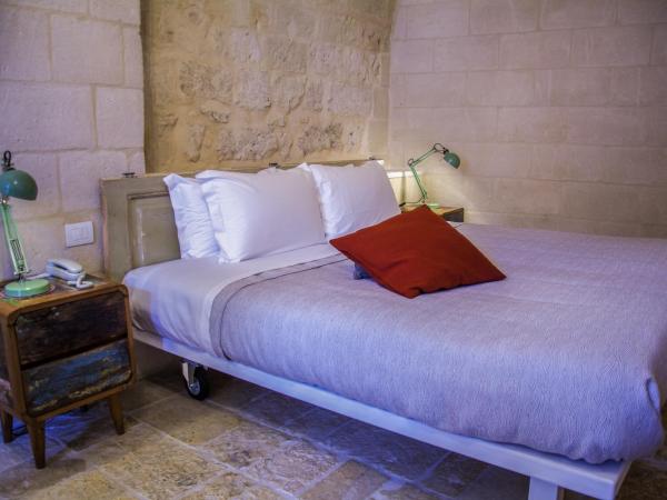 Thymus Residence nei Sassi : photo 2 de la chambre suite avec bain turc - troglodyte