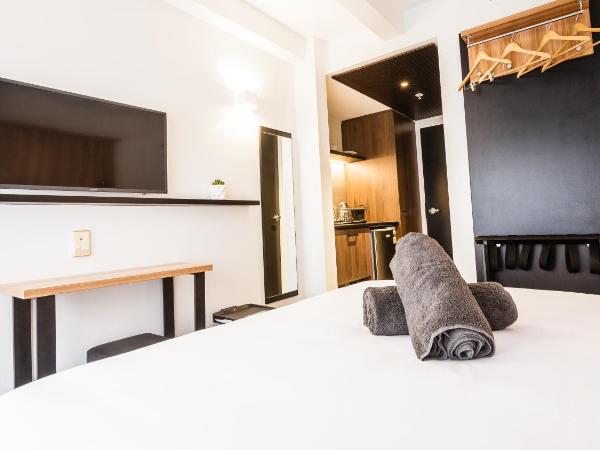 No. 9 Hotel : photo 1 de la chambre studio lit queen-size avec salle de bains privative