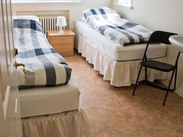 Igdlo Guesthouse : photo 3 de la chambre chambre lits jumeaux avec salle de bains commune