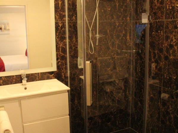 Bealey Plaza Motel : photo 3 de la chambre studio lit king-size