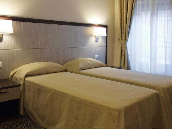 Hotel Alpi Resort : photo 5 de la chambre chambre lits jumeaux