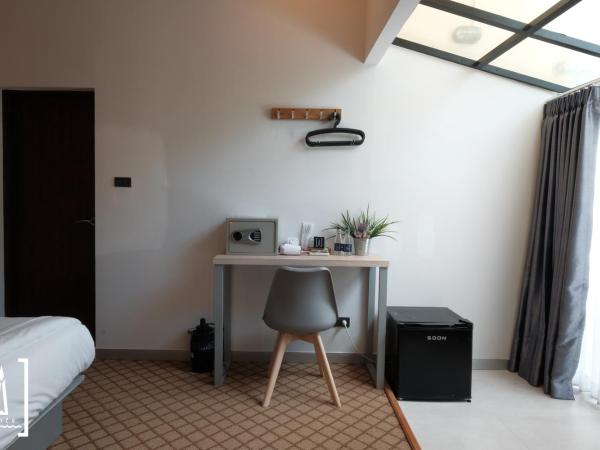 i-river chiangmai : photo 7 de la chambre suite (côté rue) - vue sur rivière