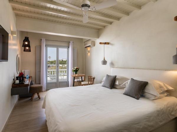 Poseidon Hotel Suites : photo 1 de la chambre chambre double ou lits jumeaux supérieure