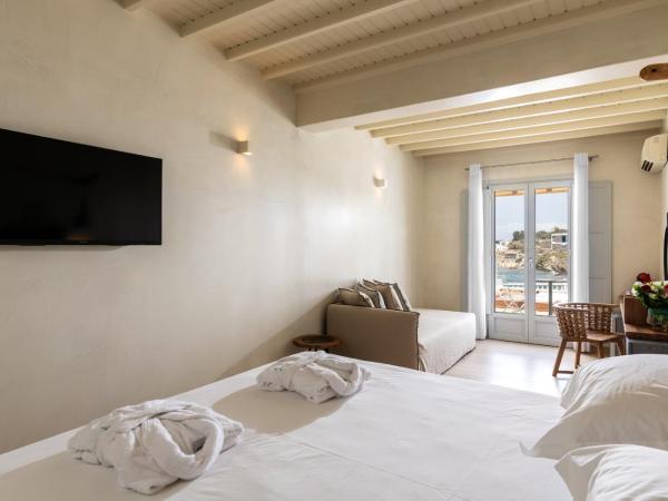 Poseidon Hotel Suites : photo 4 de la chambre chambre lit double ou lits jumeaux supérieure - front de mer