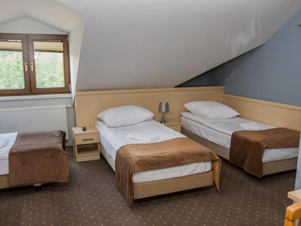 Dworek Jabłonna : photo 4 de la chambre chambre familiale