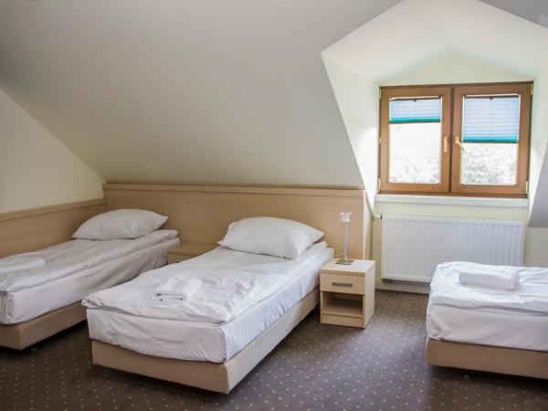 Dworek Jabłonna : photo 4 de la chambre chambre triple classique