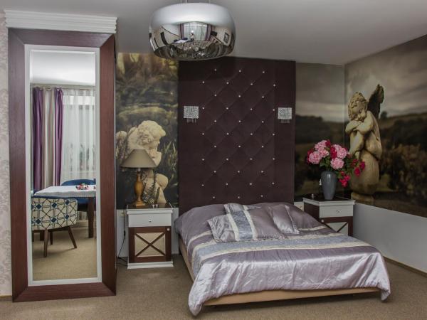 Dworek Jabłonna : photo 3 de la chambre grande chambre double