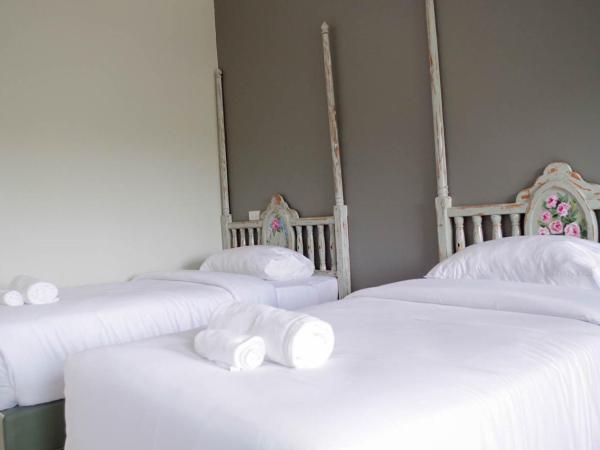 Phuket Nonnita Boutique Resort - SHA Plus : photo 5 de la chambre chambre lits jumeaux deluxe