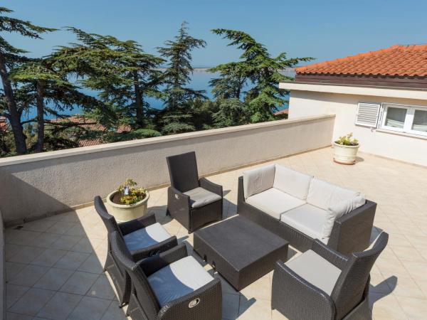 Hotel Abalone : photo 6 de la chambre  appartement de luxe - vue sur mer (4 adultes + 2 enfants)