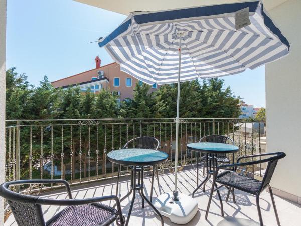 Guesthouse Bencun Medulin : photo 6 de la chambre appartement avec terrasse