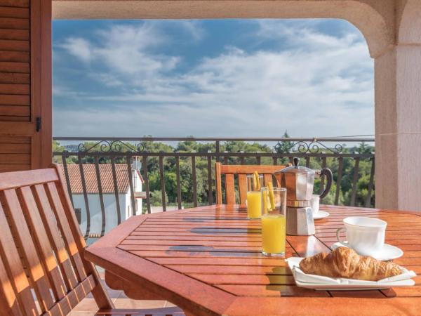 Apartments Villa Tre Marie : photo 1 de la chambre appartement 1 chambre confort avec balcon et vue sur mer