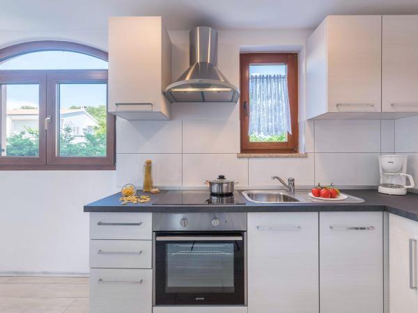 Apartments Villa Tre Marie : photo 2 de la chambre appartement avec balcon