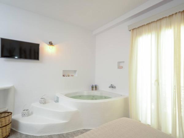 Blue Sky Summer : photo 2 de la chambre suite avec baignoire spa intérieure