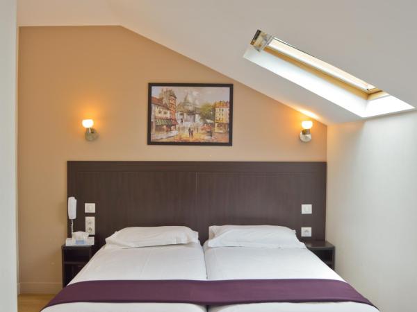 Hôtel du Quai de Seine : photo 2 de la chambre chambre lits jumeaux