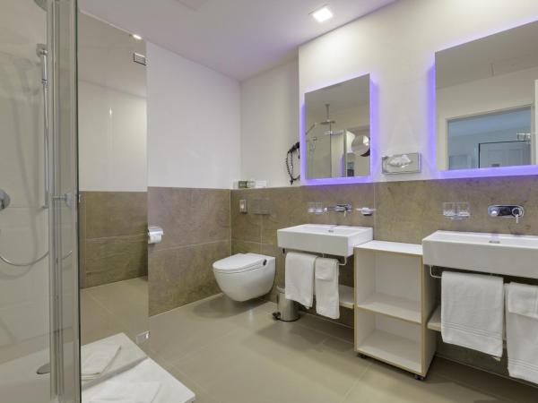 Boutique Hotel Bellevue : photo 4 de la chambre hébergement familial boutique - vue sur jardin