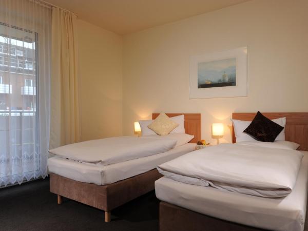 Air Hotel Wartburg : photo 1 de la chambre chambre lits jumeaux