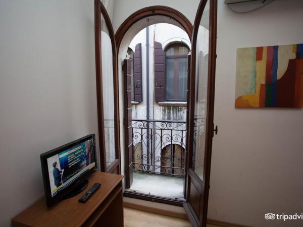 Hotel Caprera : photo 2 de la chambre chambre quadruple